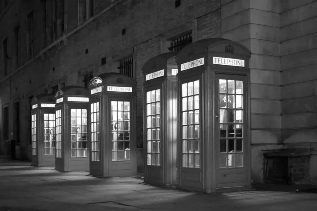 A row of traditional red telephone boxes